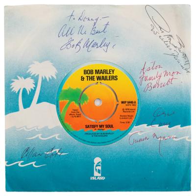 Lot #620 Bob Marley and Peter Tosh Signed 45 RPM Record Sleeve - Image 1