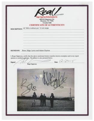 Lot #5370 U2 Signed Album - Image 4