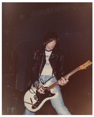 Lot #638 Johnny Ramone Signed Photograph and Stage-Used Guitar Pick