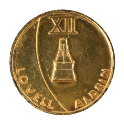 Lot #3065 Buzz Aldrin's Gemini 12 Flown Gold-Plated Fliteline Medallion