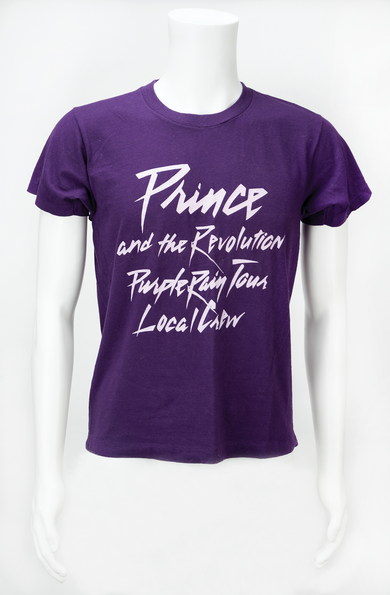 Lot #4606 Prince: Purple Rain Tour Crew Shirt and (5) Backstage Passes