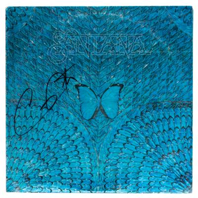 Lot #4314 Carlos Santana Signed Album - Image 1
