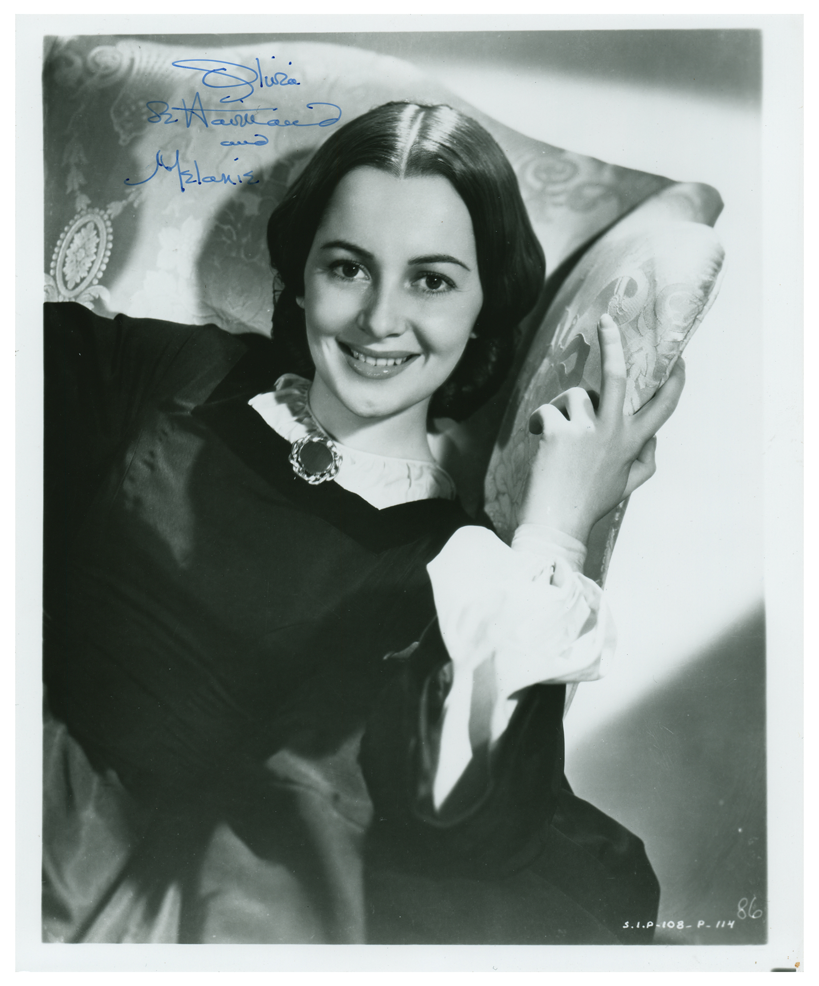 Olivia de Havilland Signed Photograph | RR Auction