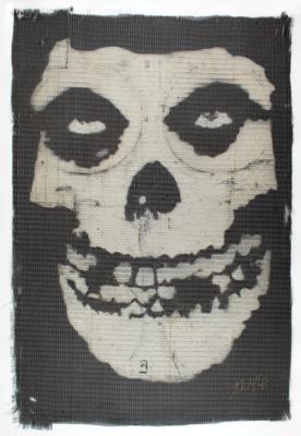 Lot #9026 Misfits Stage-Used 'Fiend Skull' Speaker Cloth Signed by Doyle