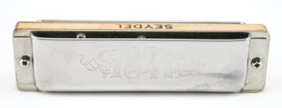 Lot #767 Prince's Personally-Owned and Played Harmonica