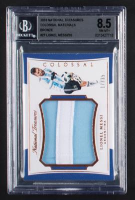 Lot #1058 2018 National Treasures Colossal Materials Bronze Lionel Messi Patch (17/35) BGS NM-MT+ 8.5 - Image 1