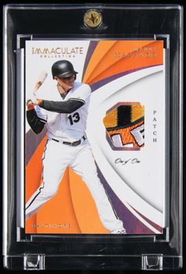 Lot #845 2018 Immaculate Collection Manny Machado Game-Used Logo Patch (1/1) - Image 1