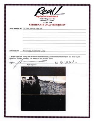 Lot #2309 U2 Signed Album - Image 2