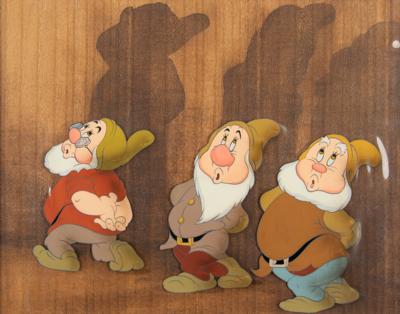 Lot #668 Doc, Sneezy, and Happy production cel from Snow White and the Seven Dwarfs - Image 1