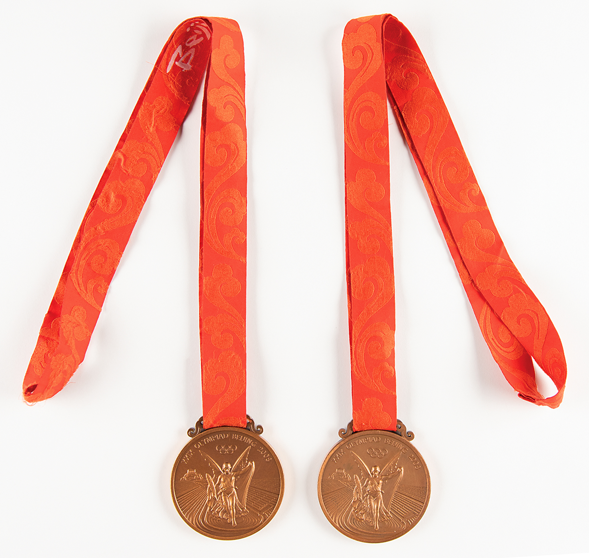 Lot #4038 Ryan Lochte's Beijing 2008 Summer Olympics (2) Bronze Winner's Medals