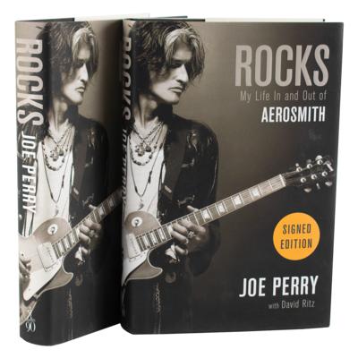 Lot #636 Aerosmith: Joe Perry (2) Signed Books