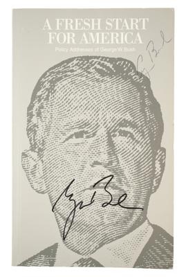 Lot #30 George and George W. Bush Signed Book - Image 1