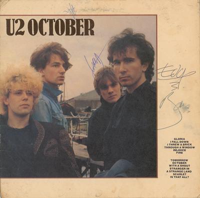 Lot #8420 U2 Signed Album