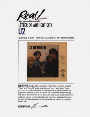 Lot #8420 U2 Signed Album - Image 2