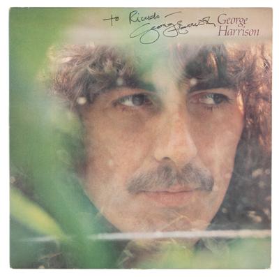 Lot #8063 George Harrison Signed Album - Image 1