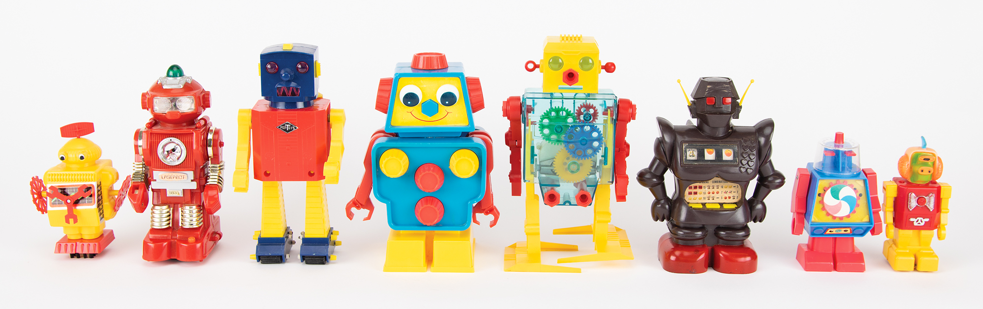 Lot #211 Vintage Lot of (8) Second Generation Battery Powered and Wind-up Toy Robots from the collection of Andres Serrano