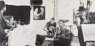 Lot #562 U2 Signed Album - Image 1