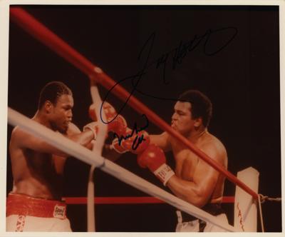 Lot #885 Muhammad Ali and Larry Holmes Signed