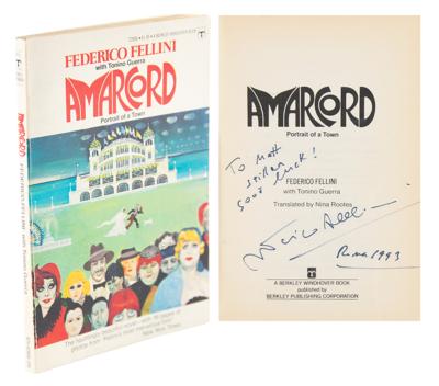 Lot #811 Federico Fellini Signed Book and Endorsed Check