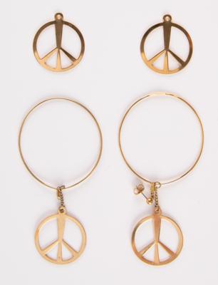 Lot #8067 Prince's Stage-Worn Peace Earrings and Boot Chams (4) from the Lovesexy Tour