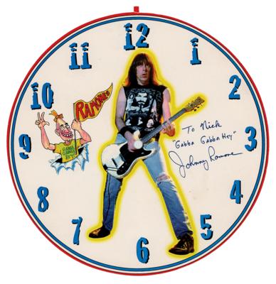 Lot #3400 Johnny Ramone Signed Clock Face Inscribed to Nicolas Cage