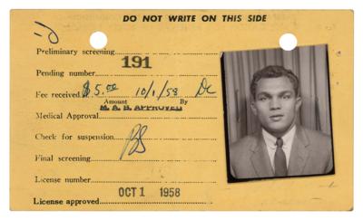 Lot #663 Carlos Ortiz Thrice-Signed Boxing License (1958) - Image 1