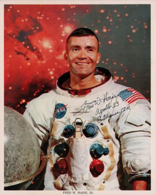 Lot #301 Apollo Astronauts: Richard Gordon, Fred Haise, and Al Worden (3) Signed Photographs