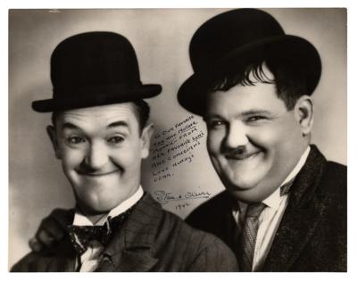 Lot #557 Stan Laurel and Oliver Hardy Signed Oversized Photograph - Image 1