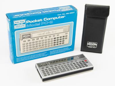 Lot #5054 TRS-80 Pocket Computer 2 (PC-2) with (2) Interface Accessories - Image 1