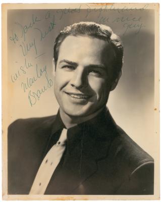 Lot #556 Marlon Brando Signed Photograph for Guys and Dolls, Inscribed to "a great fighter and a nice guy" - Image 1