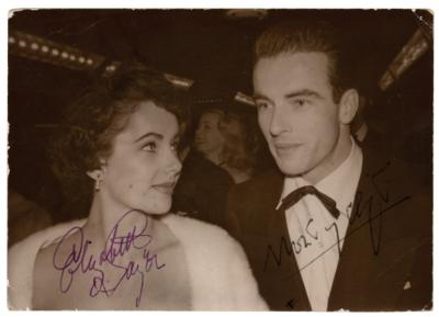 Lot #637 Elizabeth Taylor and Montgomery Clift Signed Candid Photograph - Image 1