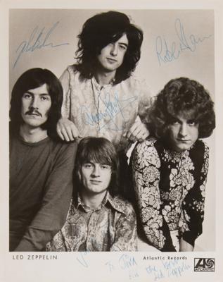 Lot #9089 Unprecedented vintage-signed promo photo of Led Zeppelin, with its original 1969 Atlantic Records press folder