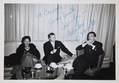 Lot #450 Marlon Brando Signed Photograph - Pictured with Salvador Dali - Image 1