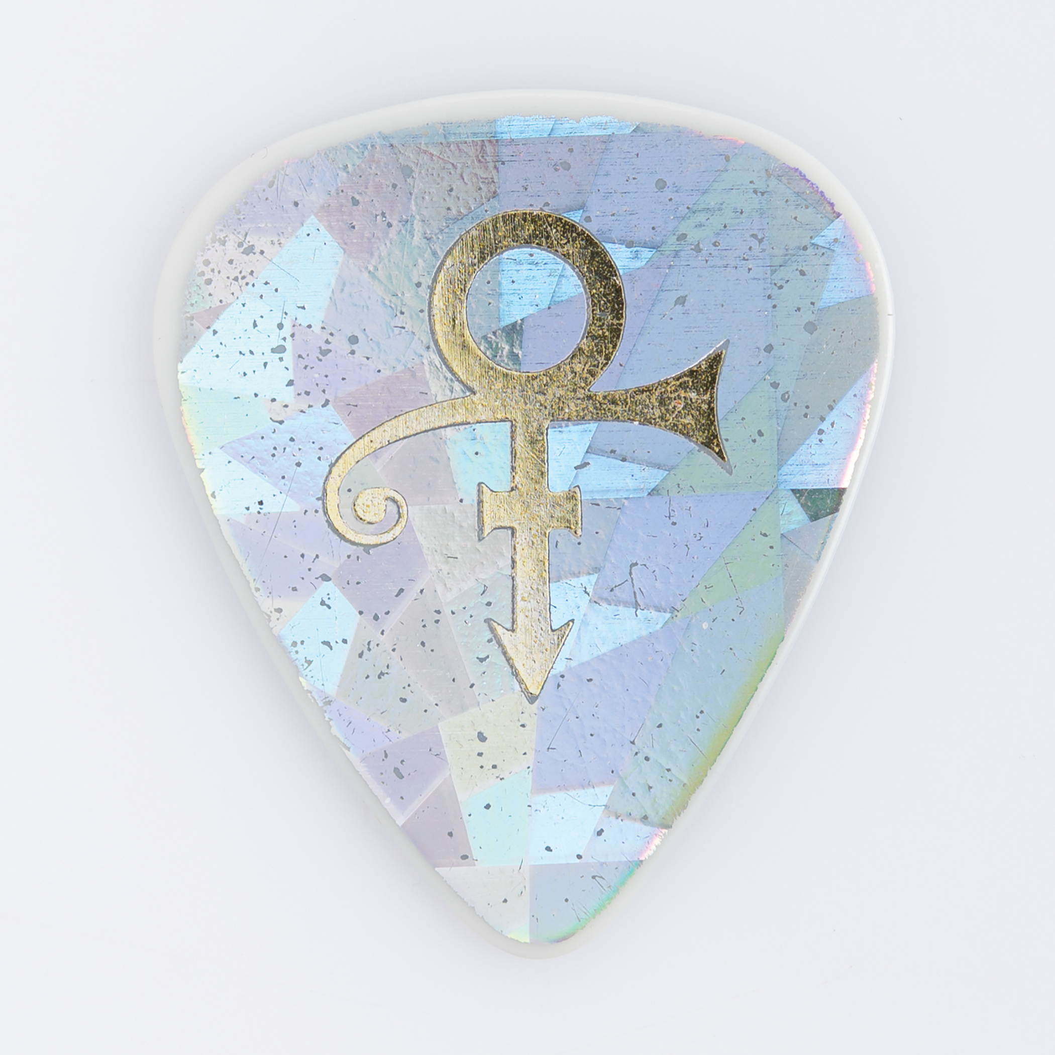 Lot #486 Prince's Stage-Used Holographic 'Love Symbol' Guitar Pick - Image 1