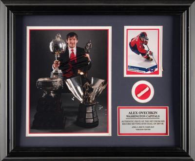 Lot #606 Alex Ovechkin Signed Photograph with Net Relic - Image 1