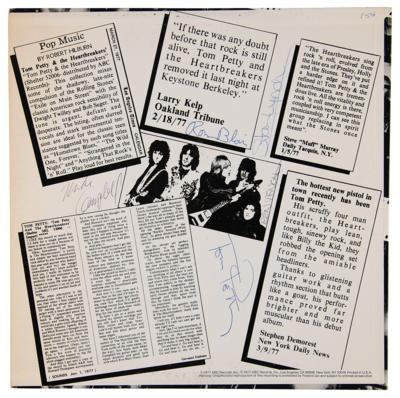 Lot #399 Tom Petty and the Heartbreakers Signed Promotional Album – Official Live ‘Leg - Image 1