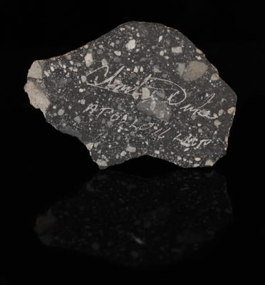 Lot #4279 Northwest Africa (NWA) 14769 Lunar Meteorite Slice Signed by Apollo 16 Moonwalker Charlie Duke - Image 1