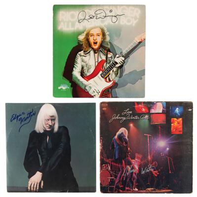 Lot #705 Johnny and Edgar Winter, and Rick Derringer (3) Signed Albums - Image 1
