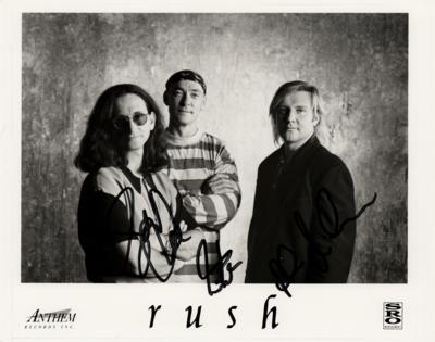Lot #5194 Rush Signed Photograph - Image 1
