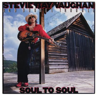 Lot #5235 Stevie Ray Vaughan Signed Album - Soul to Soul - Image 1
