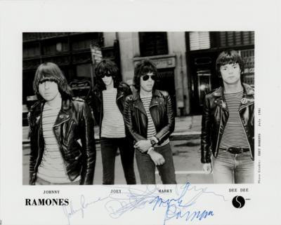 Lot #5222 Ramones Signed Photograph with Sire Records Press Folder and Hampton Beach Club Casino Napkin Signed by Johnny and Dee Dee Ramone - Image 1