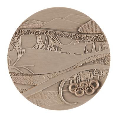 Lot #3158 Vancouver 2010 Winter Olympics Volunteer Participation Medal - Image 1