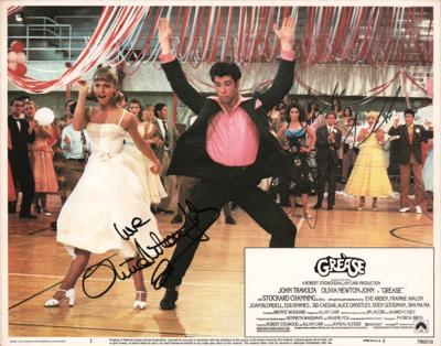 Lot #757 John Travolta and Olivia Newton-John Signed Lobby Card - Image 1