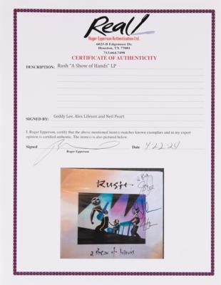 Lot #673 Rush Signed Album - A Show of Hands - Image 2