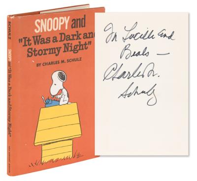 Lot #556 Charles Schulz Signed Book - Snoopy and 'It Was a Dark and Stormy Night' - Image 1