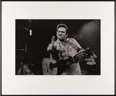 Lot #7215 Johnny Cash at San Quentin Oversized 'Middle Finger' Photograph Signed by Jim Marshall - From the Collection of Photographer Barry Feinstein - Image 2