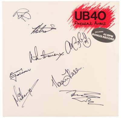 Lot #7352 UB40 Signed Album - Present Arms - Image 1