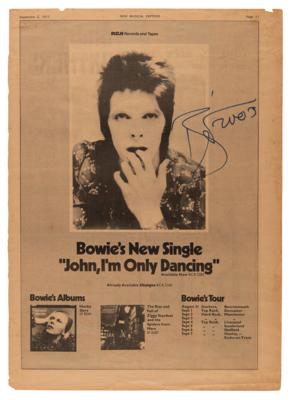 Lot #521 David Bowie Signed Newspaper Ad - Image 1