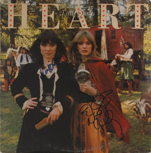 Lot #7229 Heart Signed Album: Ann and Nancy Wilson - Image 1