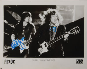 Lot #7220 AC/DC: Angus and Malcolm Young Signed Photograph - Image 1